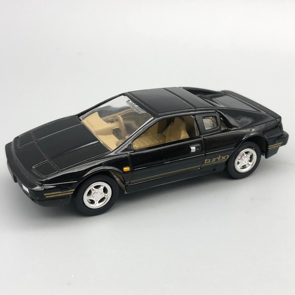 Johnny Lightning 1977 Lotus Esprit Turbo S1 Diecast Car Black Diecast 1/64 Scale
